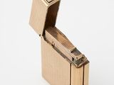 an image of a lighter that is sitting on top of a table