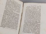 an open book that is sitting on a table