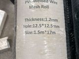 a roll of cloth wrapped in plastic sitting on a table