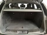 a trunk of a car with the back seats folded down