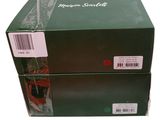 a green box with a red button on top of it