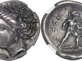 a close up of a silver coin with a woman on it