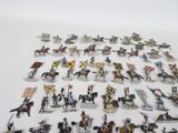 a lot of figurines of different types on the table