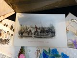 many pictures of people riding horses on a table