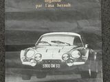 une publicité pour un salon automobile, avec la photo d'une voiture roulant sur la route