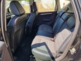 the back seats of a car that is parked in a parking lot