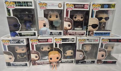 beaucoup de figurines Pop Vinyl qui se trouvent dans la boîte