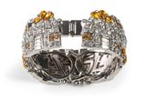 a close up of a bracelet on a white background