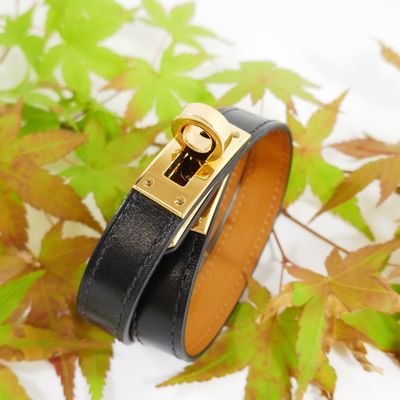 black leather bracelet with gold clasp and gold clasp