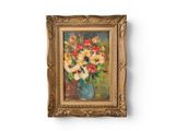 a painting of flowers in a vase on the wall