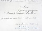 an old document with writing on it on a table