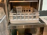 an open refrigerator with a bunch of dishes inside of it