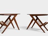 pair of folding chairs with magazine racks on each side
