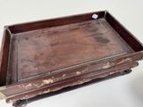 a wooden tray that is sitting on top of a table
