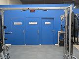 an image of a gym room with equipment in it