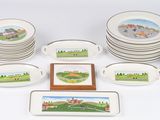 a lot of dishes and cups that are on the table