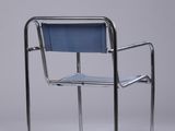 an image of a blue chair sitting on top of a white floor