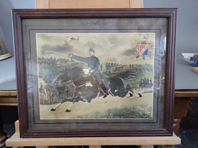 painting of a man riding a horse on display in a room