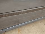 a close up of a car door handle and the door handle is missing