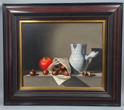 tableau encadré représentant un vase et des fruits posés sur une table