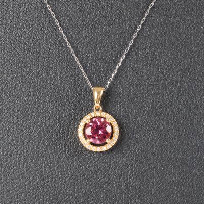 un pendentif en tourmaline rose et diamants, monté sur une chaîne en argent