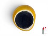 a yellow vase with a black rim on a white surface