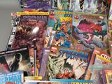 a lot of comic books that are on the table