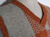an image of a knitted vest on a mannequin mannequin