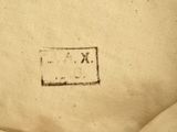 an old picture of a piece of paper with a stamp on it