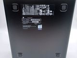 the back of a laptop with a black back panel and a white back panel
