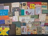 many books on the table with a hanukah menorah on it