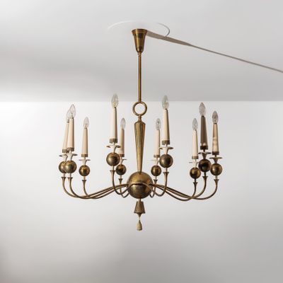 a close up of a chandelier hanging from a ceiling