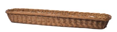 un gros plan d'un panier en osier sur fond blanc