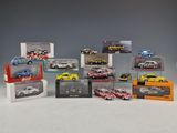 a lot of toy cars that are in a display case