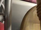 a close up of a person ' s legs and luggage on a bus
