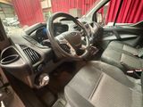 the interior of a car with a steering wheel and dashboard