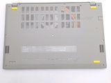 a silver laptop with a yellow sticker on it