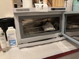 a toaster oven with a lot of food inside of it