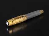 a pen that is sitting on a black surface