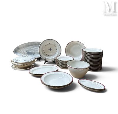 a lot of plates and bowls sitting on a table