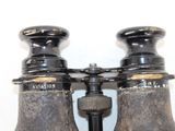 a pair of binoculars that are sitting on a table