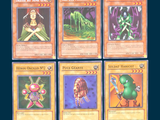 four different pokemon cards are shown on a blue background