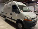 a white van that is parked in a garage