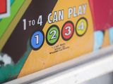a close up of a pinball machine with a number on it