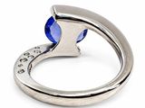 an image of a blue stone ring on a white background