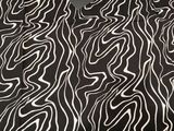 haut noir et blanc orné d'un motif zébré