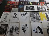 a lot of pictures on the table with a lot of them