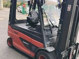 a forklift that is parked in the parking lot