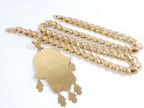 gold plated necklace with chain and tassel
