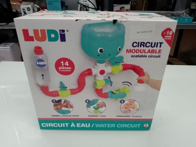 a box that has a toy in it on a table